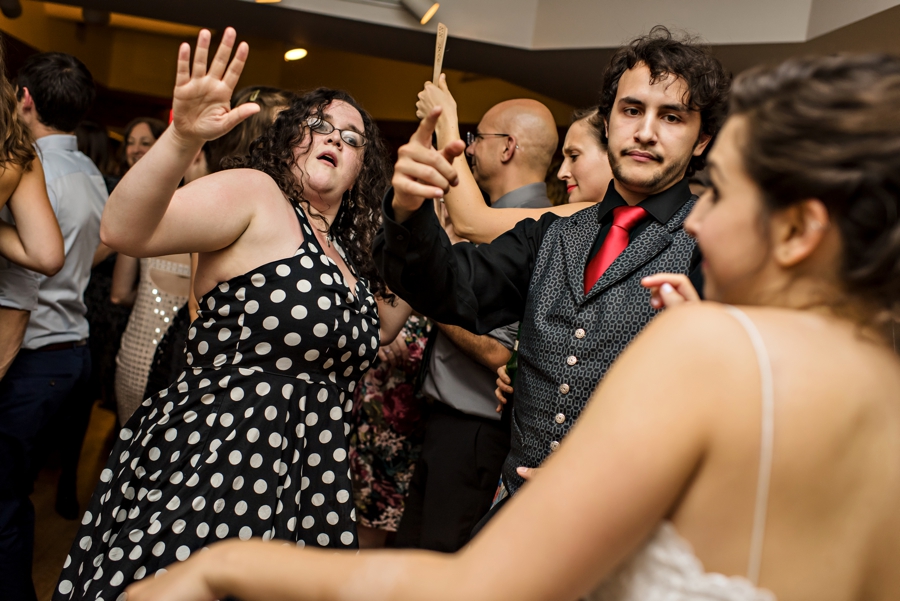 A bride dancing with her friends at a Philly Wedding.